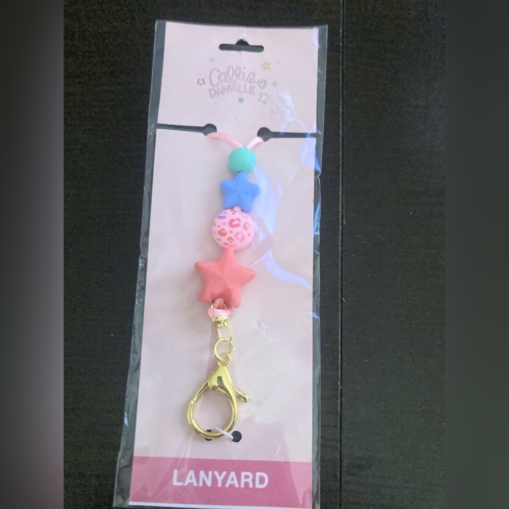 4/$25 Callie Danielle lanyard with stars. Brand new.3 available. Bundle to save